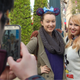 Leo Camacho snaps a photo of Tiffany Mink and a fan.